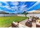 Staged patio with comfortable seating and dining area, enhancing the outdoor living experience at 2084 La Palma Ave, Port Charlotte, FL 33953