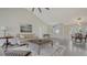 Inviting living space featuring tile flooring, a neutral palette, and view to the dining room at 2115 Timucua Trl, Nokomis, FL 34275