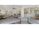 Bright interior showcasing seamless transitions between living, dining, and kitchen areas at 2115 Timucua Trl, Nokomis, FL 34275
