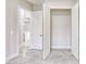 This interior closet shows open doors, revealing a spacious layout and white paint at 22 Medalist Cir, Rotonda West, FL 33947