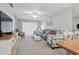 Bright living room featuring modern furnishings, light gray walls, and plush seating, perfect for relaxation at 2220 Stickney Point Rd # 531, Sarasota, FL 34231