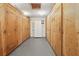 Organized storage room with multiple wooden lockers, offering ample space for personal belongings and equipment at 2220 Stickney Point Rd # 531, Sarasota, FL 34231