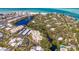 An aerial view of condos in a lush area at 225 Hourglass Way # 101, Sarasota, FL 34242