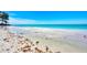 Enjoy the beautiful white sands of the community's private beach at 225 Hourglass Way # 101, Sarasota, FL 34242