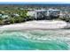 Breathtaking beachfront condos with crystal-clear turquoise water and soft sandy beach at 225 Hourglass Way # 101, Sarasota, FL 34242