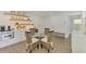 A dining area with modern furnishings and stylish decor at 225 Hourglass Way # 101, Sarasota, FL 34242