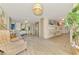 A condo lobby with comfortable seating, tile floors, and updated decor at 225 Hourglass Way # 101, Sarasota, FL 34242