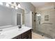 Bathroom boasts a glass shower and a sleek vanity with ample storage space at 2254 50Th Street E Cir, Palmetto, FL 34221