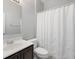 Bright bathroom with white vanity, large mirror, and decorative shower curtain at 2254 50Th Street E Cir, Palmetto, FL 34221