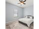 Relaxing bedroom with neutral colors, plush carpeting and comfortable furnishings at 2254 50Th Street E Cir, Palmetto, FL 34221