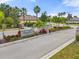The community entrance has lush landscaping with stone and decorative monument, 'Oakhurst Park' at 2254 50Th Street E Cir, Palmetto, FL 34221