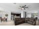 Open living room features tile floors, view to kitchen, and ceiling fan at 2254 50Th Street E Cir, Palmetto, FL 34221