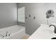 The main bathroom is equipped with a soaking tub, vanity area, and modern fixtures at 2254 50Th Street E Cir, Palmetto, FL 34221