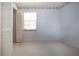 Simple bedroom with natural light, offering a blank canvas for personalization and comfortable living at 2511 Lords Ln, Sarasota, FL 34231