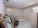 This bedroom features a ceiling fan, a bed, and a window at 2511 Lords Ln, Sarasota, FL 34231