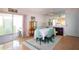 Bright dining room with patio access, mirrored wall, and dining set at 2511 Lords Ln, Sarasota, FL 34231