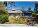 Charming home with a welcoming front yard and a convenient attached two-car garage at 2511 Lords Ln, Sarasota, FL 34231