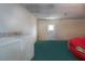 This garage features a washer, dryer, a door, and a car at 2511 Lords Ln, Sarasota, FL 34231