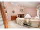 Comfortable living room with fireplace, piano, and cozy seating area at 2511 Lords Ln, Sarasota, FL 34231