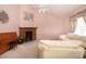 Clean living room with fireplace, piano, vaulted ceilings, and comfortable seating at 2511 Lords Ln, Sarasota, FL 34231