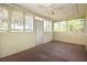 Sunroom with multiple windows bringing in an abundance of natural light at 2511 Lords Ln, Sarasota, FL 34231