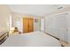 Comfortable bedroom with closet and a large window offering ample natural light at 2778 Greendale Dr, Sarasota, FL 34232