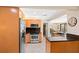 Modern kitchen with stainless steel appliances and ample cabinet space at 2778 Greendale Dr, Sarasota, FL 34232