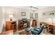 Cozy sitting room featuring natural light, built-in storage, and comfortable furniture at 2778 Greendale Dr, Sarasota, FL 34232