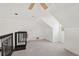 Attic room with carpeted flooring, dormer, and ceiling fan at 28706 102Nd E Dr, Myakka City, FL 34251