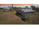 Backyard of home featuring deck and stairs to the grass at 28706 102Nd E Dr, Myakka City, FL 34251