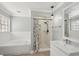 Bathroom with tub, separate shower, and updated sink vanity at 28706 102Nd E Dr, Myakka City, FL 34251