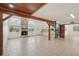 Spacious room features stone fireplace and views of the backyard pool at 28706 102Nd E Dr, Myakka City, FL 34251