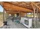 Interior view of the workshop shed with exposed beams and washer and dryer at 28706 102Nd E Dr, Myakka City, FL 34251