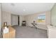 Neutral room with a cabinet, reading chair, and keyboard at 2969 Great Abaco Way, Bradenton, FL 34208