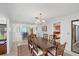 Dining room featuring a wooden table and seating for six at 3698 Glen Oaks Manor Dr, Sarasota, FL 34232