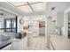 Bright, clean kitchen with a ceiling fan, lots of counter space and white appliances at 3698 Glen Oaks Manor Dr, Sarasota, FL 34232