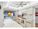 Clean and bright kitchen with modern appliances and a view through the window at 3698 Glen Oaks Manor Dr, Sarasota, FL 34232