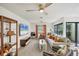 Comfortable living room features lots of seating, ceiling fans and a view of the backyard at 3698 Glen Oaks Manor Dr, Sarasota, FL 34232