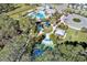 Community featuring a playground, tennis court, and clubhouse from above at 4031 Cottage Hill Ave, Parrish, FL 34219