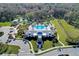 Stunning aerial view of the community pool, club house, and lush landscaping at 4031 Cottage Hill Ave, Parrish, FL 34219