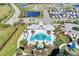 Aerial view of the community pool, park, and residential homes at 4031 Cottage Hill Ave, Parrish, FL 34219