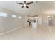 Open living space with tile floors, neutral paint, recessed lighting, a kitchen with island, and a chandelier in the dining area at 4031 Cottage Hill Ave, Parrish, FL 34219