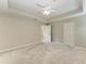 Spacious main bedroom with carpet flooring, closet, and ensuite bathroom access at 4031 Cottage Hill Ave, Parrish, FL 34219