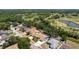 Overhead view of a residence situated near a golf course, showcasing its access to leisure and green spaces at 4219 Berkshire Dr, Sarasota, FL 34241