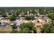 Aerial shot showcases a home in a residential area, conveniently located near community amenities and services at 4219 Berkshire Dr, Sarasota, FL 34241