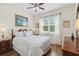 Bedroom with ample natural light, hard wood floors, and calming paint colors at 4262 70Th Street E Cir, Palmetto, FL 34221
