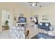 Spacious living room featuring tile flooring, natural light, and comfortable seating at 4262 70Th Street E Cir, Palmetto, FL 34221