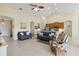 Inviting open-concept living room with tile floors, and access to the kitchen and other rooms at 4262 70Th Street E Cir, Palmetto, FL 34221