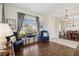 Comfortable living room features hard wood flooring, an abundance of natural light, and neutral paint at 4262 70Th Street E Cir, Palmetto, FL 34221