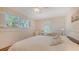 A bedroom with a large window and a desk at 5024 Commonwealth Dr, Sarasota, FL 34242